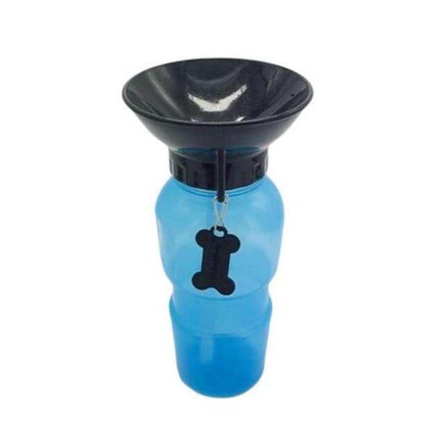 portable dog water bottle on grass