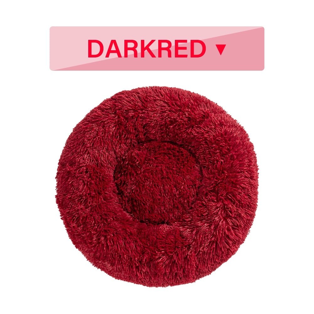 Fluffy donut pet bed showing raised rim and plush texture