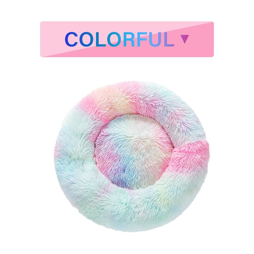 Fluffy donut pet bed with small dog sleeping peacefully
