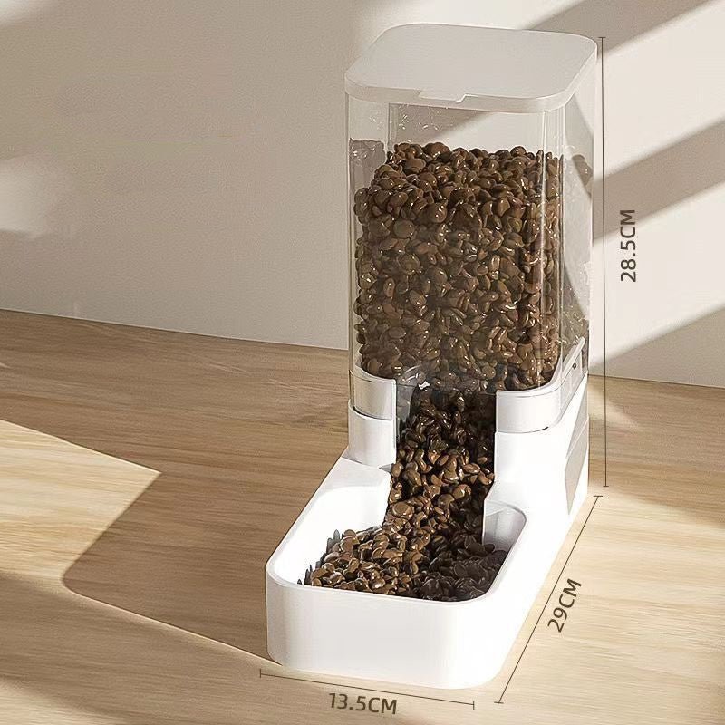 refilling food into automatic pets feeder dispenser